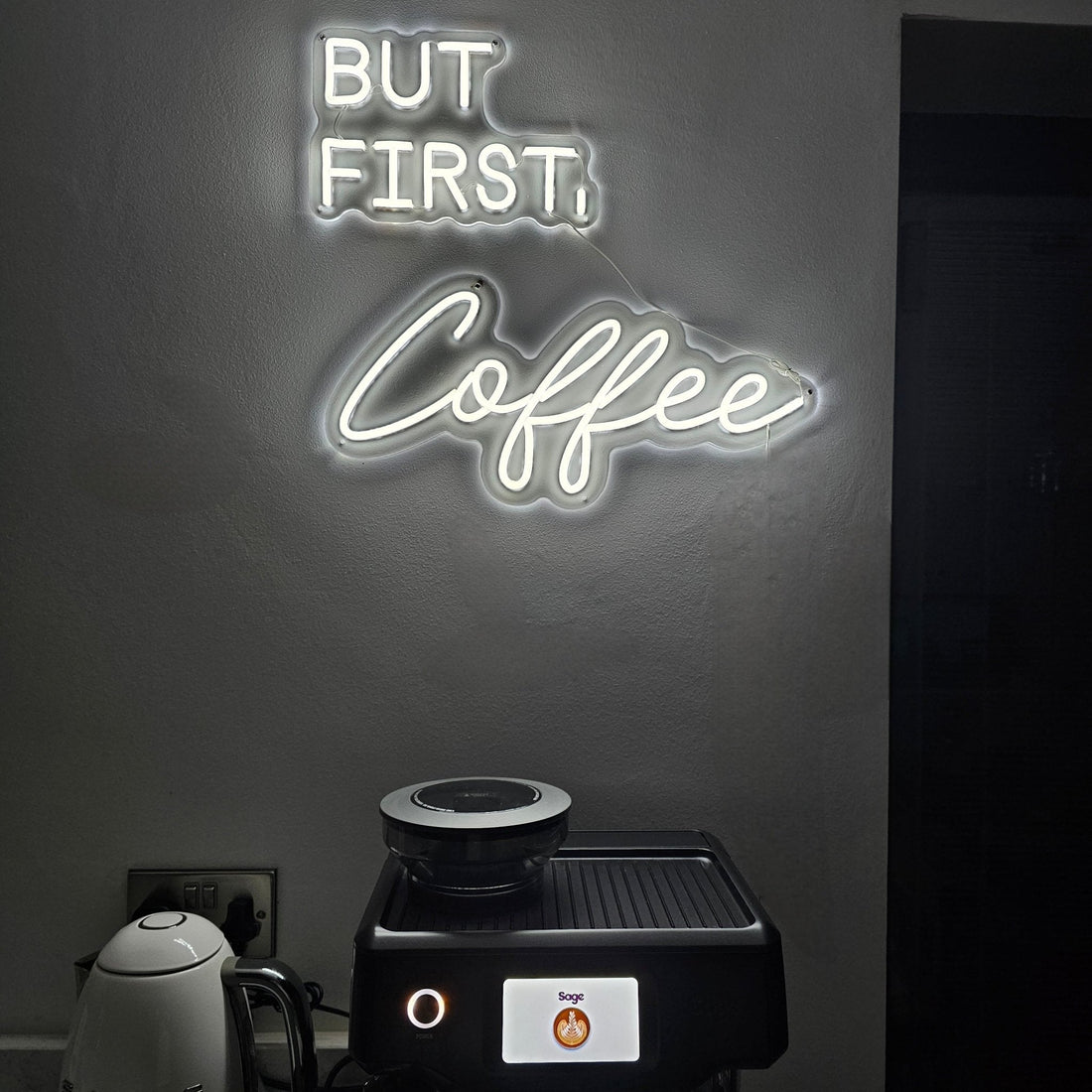 BUT FIRST, Coffee LED neon sign by UV Neon in a modern kitchen setup with espresso machine and kettle