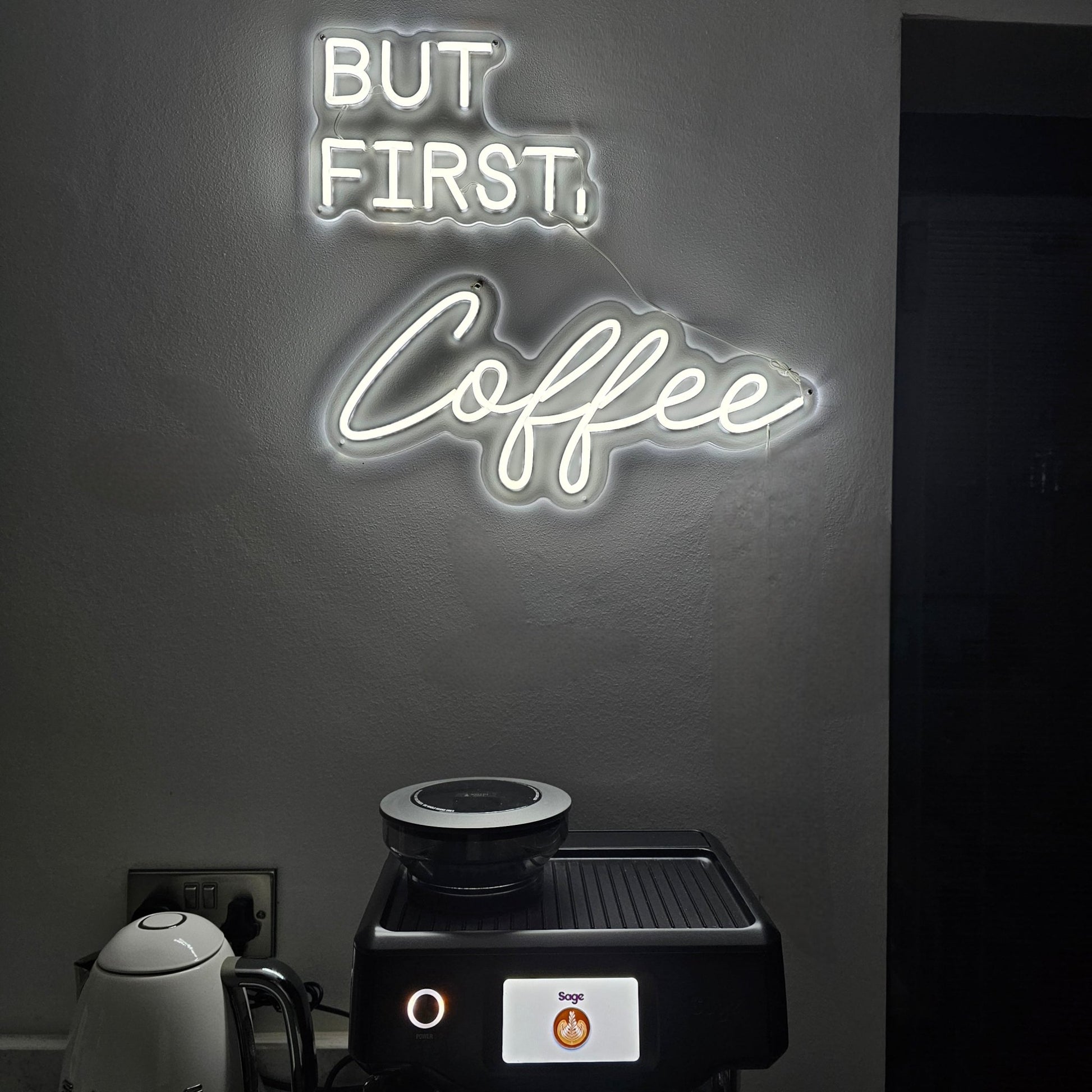 BUT FIRST, Coffee neon sign in white LED flex with acrylic backing mounted on a grey wall above a Sage Barista Touch coffee machine – perfect for home coffee setups and kitchen décor