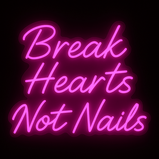 Break Hearts Not Nails neon sign in hot pink LED with acrylic backing, perfect for bold nail bar and beauty studio decor.
