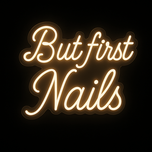 But First Nails neon sign in warm white LED with acrylic backing, ideal for salon and beauty room wall decor.