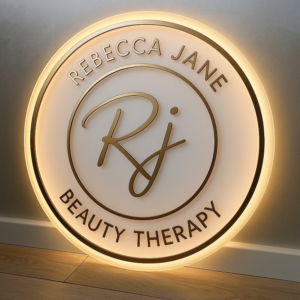 Custom backlit acrylic sign with LED lighting for RJ Beauty Therapy, round design with warm white glow, ideal for salons and business branding