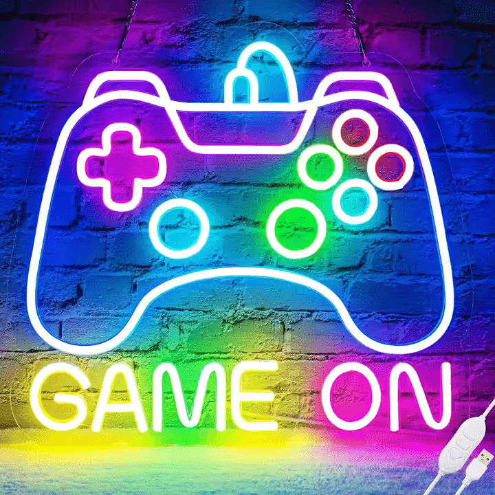 Game On Gamepad neon sign in multicolour LED flex shaped like a controller – glowing on exposed brick wall with vivid rainbow colours