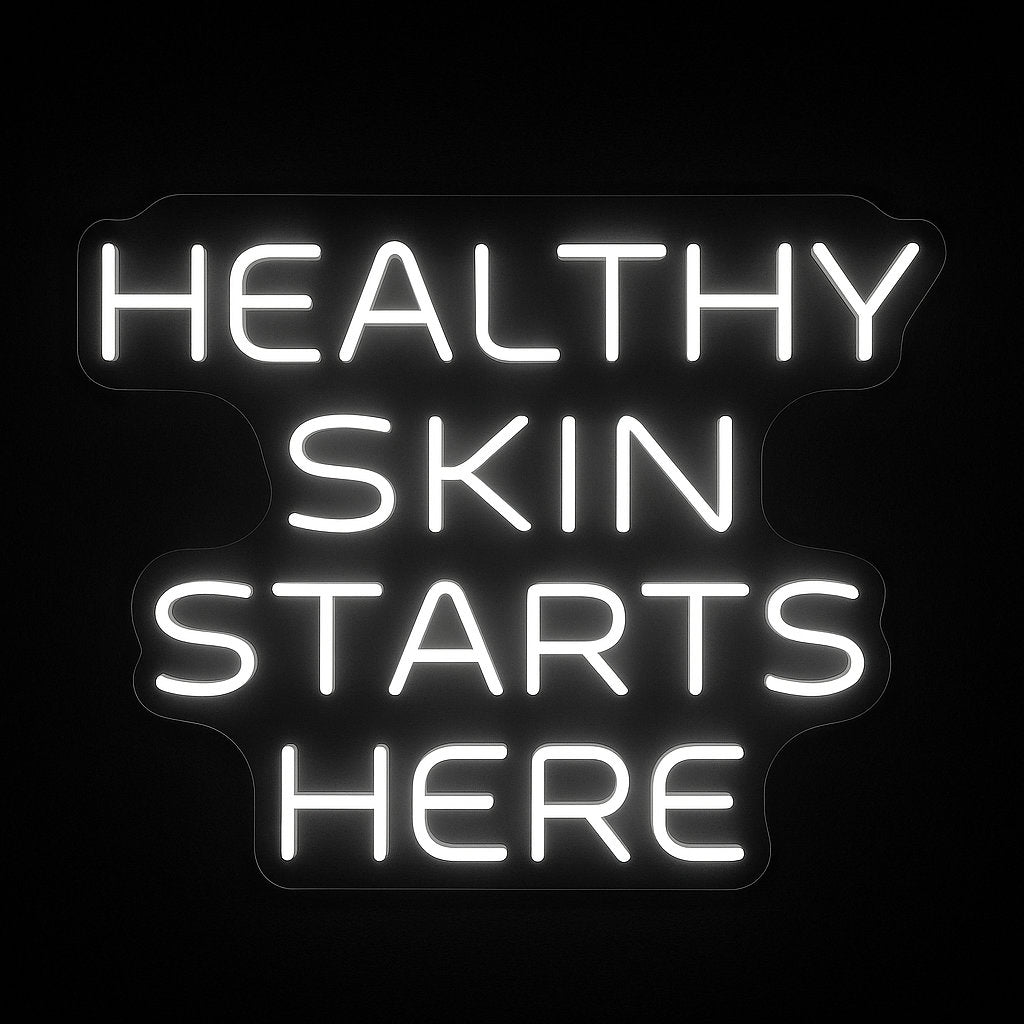 Healthy Skin Starts Here neon sign in white LED flex with acrylic backing on black background – ideal for salons, skincare studios, and facial rooms
