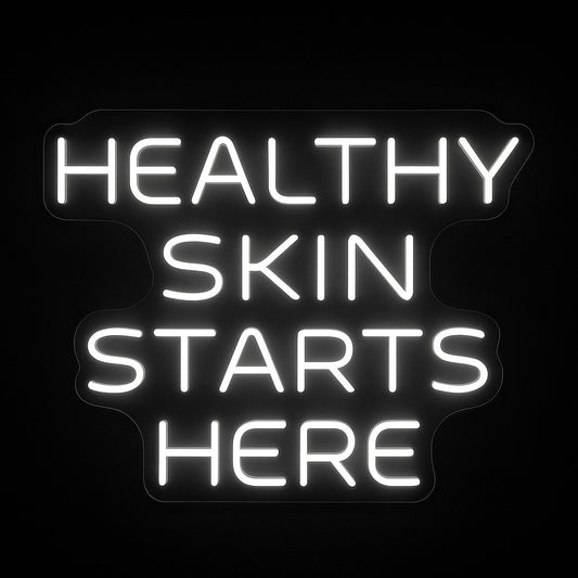 Healthy Skin Starts Here neon sign in white LED flex with acrylic backing on black background – ideal for salons, skincare studios, and facial rooms
