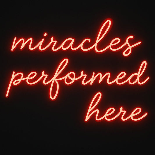 miracles performed here neon sign in LED flex with clear acrylic backing on black background – ideal for salons, barbers, and beauty studios