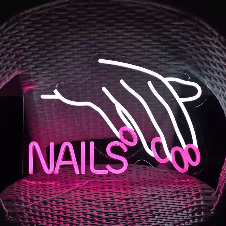 Nails Pose neon sign in pink and white LED flex with acrylic backing – glowing hand illustration with manicured nails and “NAILS” text