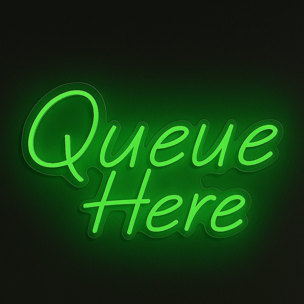 Queue Here neon sign in LED flex with acrylic backing on black background – ideal for line control in shops, cafés, and events