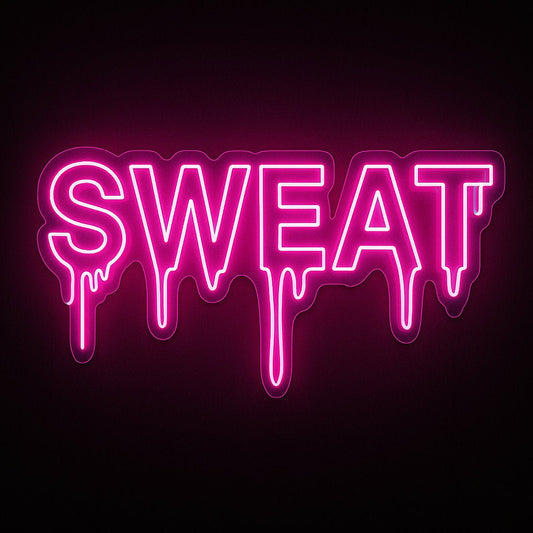 SWEAT neon sign in pink LED flex with dripping letter design and acrylic backing on black background – ideal for gym décor and fitness spaces