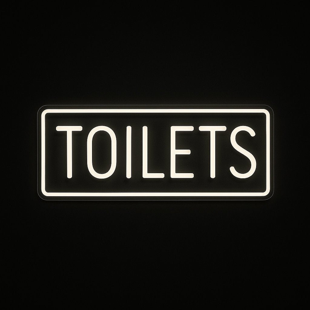 TOILETS neon sign with rectangular LED flex design and acrylic backing on black background – ideal for washrooms in restaurants, bars, and shops