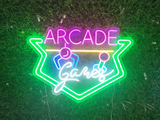 Arcade games neon sign illuminated with pink green blue LED showing retro gaming design on clear acrylic backing