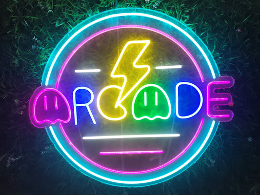 Arcade retro gaming neon sign illuminated with multicolour LED rainbow showing lightning bolt and ghost characters on clear acrylic backing