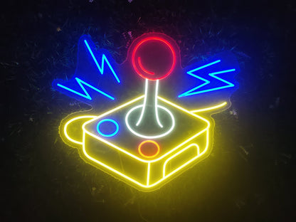 Retro joystick neon sign illuminated with multicolour LED showing arcade gaming controller design on clear acrylic backing