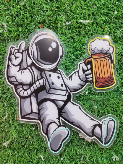 Spaceman astronaut beer neon sign switched off showing UV printed space suit design on clear acrylic backing