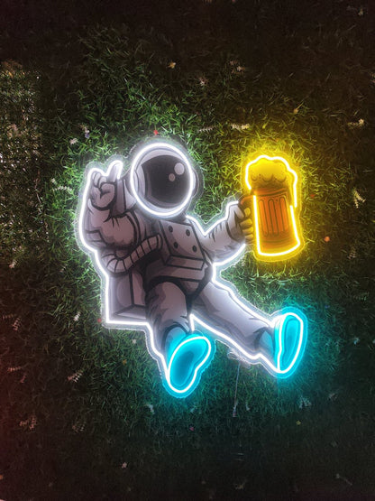 Spaceman astronaut neon sign illuminated holding beer glass with UV printed detail and multicolour LED on clear acrylic
