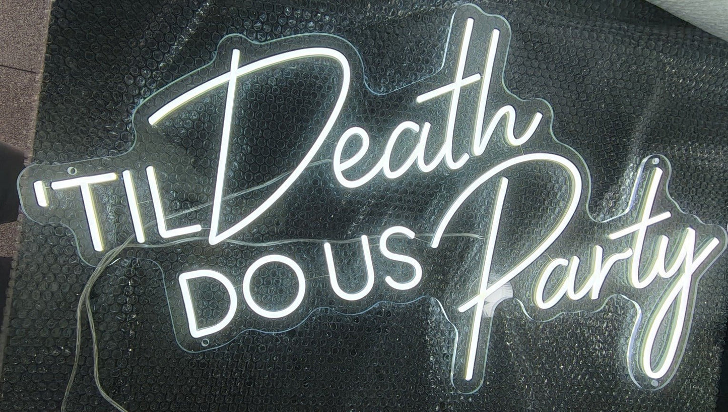 Cool white "'Til Death Do Us Party" LED neon sign in a mix of block and cursive fonts, ideal for wedding receptions and party backdrops.
